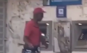 Man Spotted Attacking An ATM With A Cutlass (Video)