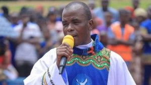 Catholic Church Suspends Father Mbaka Over Row With Buhari, Followers On Rampage