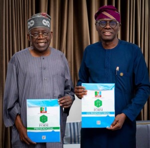 Tinubu Arrives Nigeria, Shows Off His Nomination Form With Sanwo-Olu